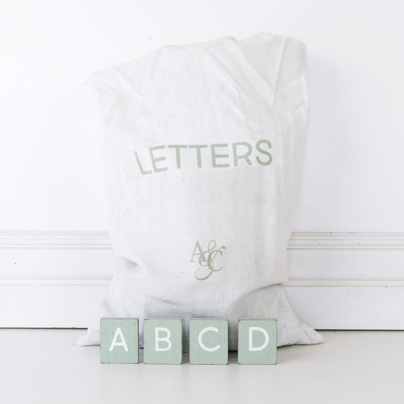 11" X 19.75" X .25" Bag of 70 pcs 1.5" X 1.75" X .25" (Tiffany Letters) Green/White