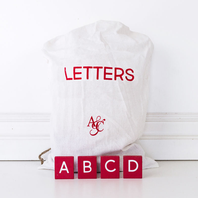 11" X 19.75" X .25" Bag of 70 pcs 1.5" X 1.75" X .25" (Crimson Letters) Red/White