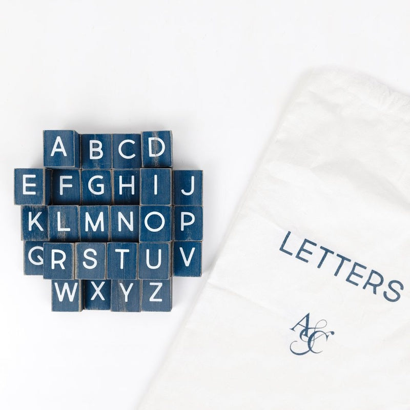 11" X 19.75" X .25" Bag 70 Pieces 1.5" X 1.75" X .25" (Denim Letters) Blue/White