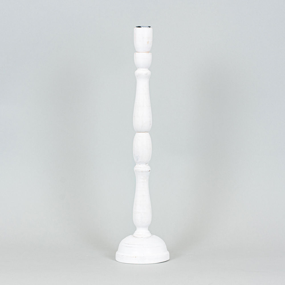 Tall white wood candle holder with a turned silhouette