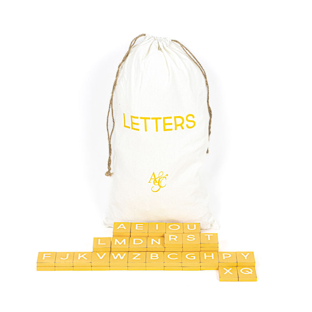 11" X 19.75" X .25" Bag 70 Pieces 1.5" X 1.75" X .25" (Mustard Letters) Yellow/White