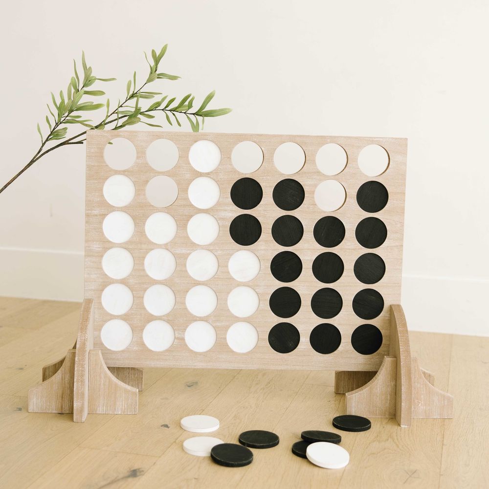 Oversized multicolor wood four in a row game with 42 playing pieces shown in product view 2