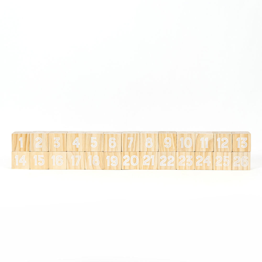 Set of 26 multicolor wood alphabet blocks.