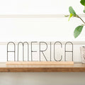 16" Wood Table Sitter - America | Black and Natural