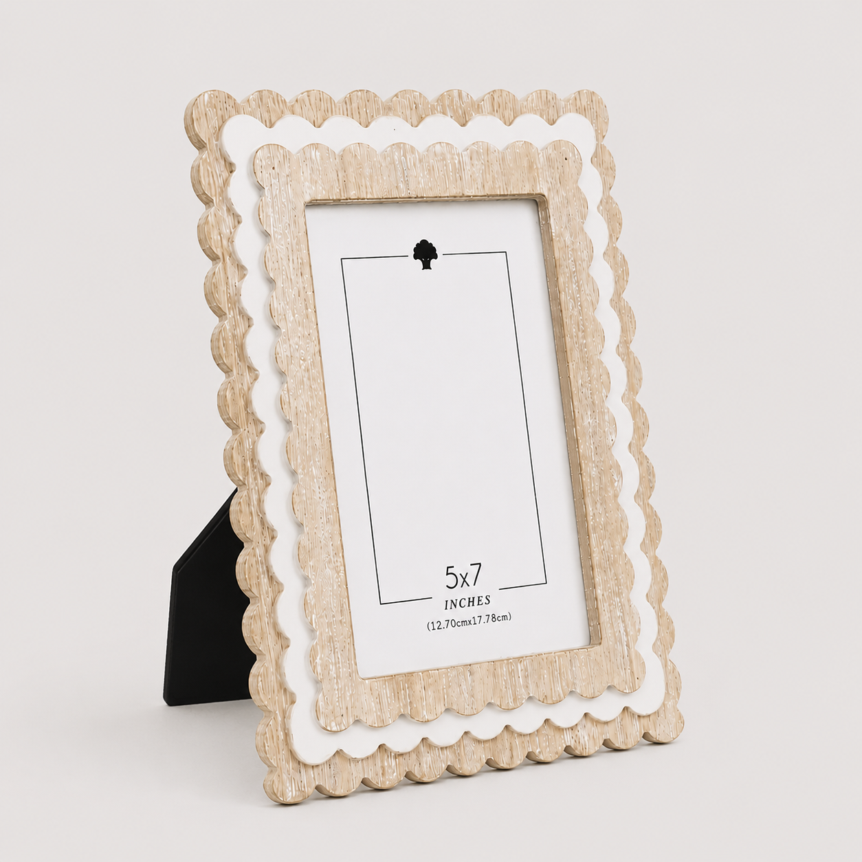 Natural and White scalloped wood picture frame holding a 5x7 photo