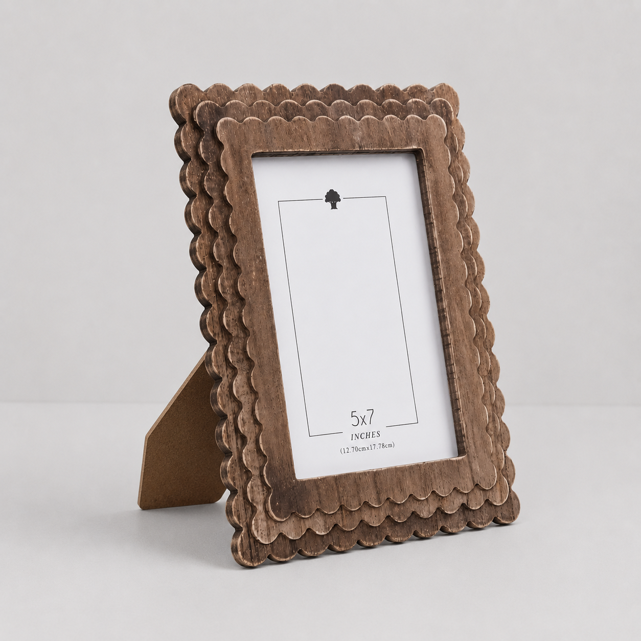 Espresso scalloped wood picture frame holding a 5x7 photo