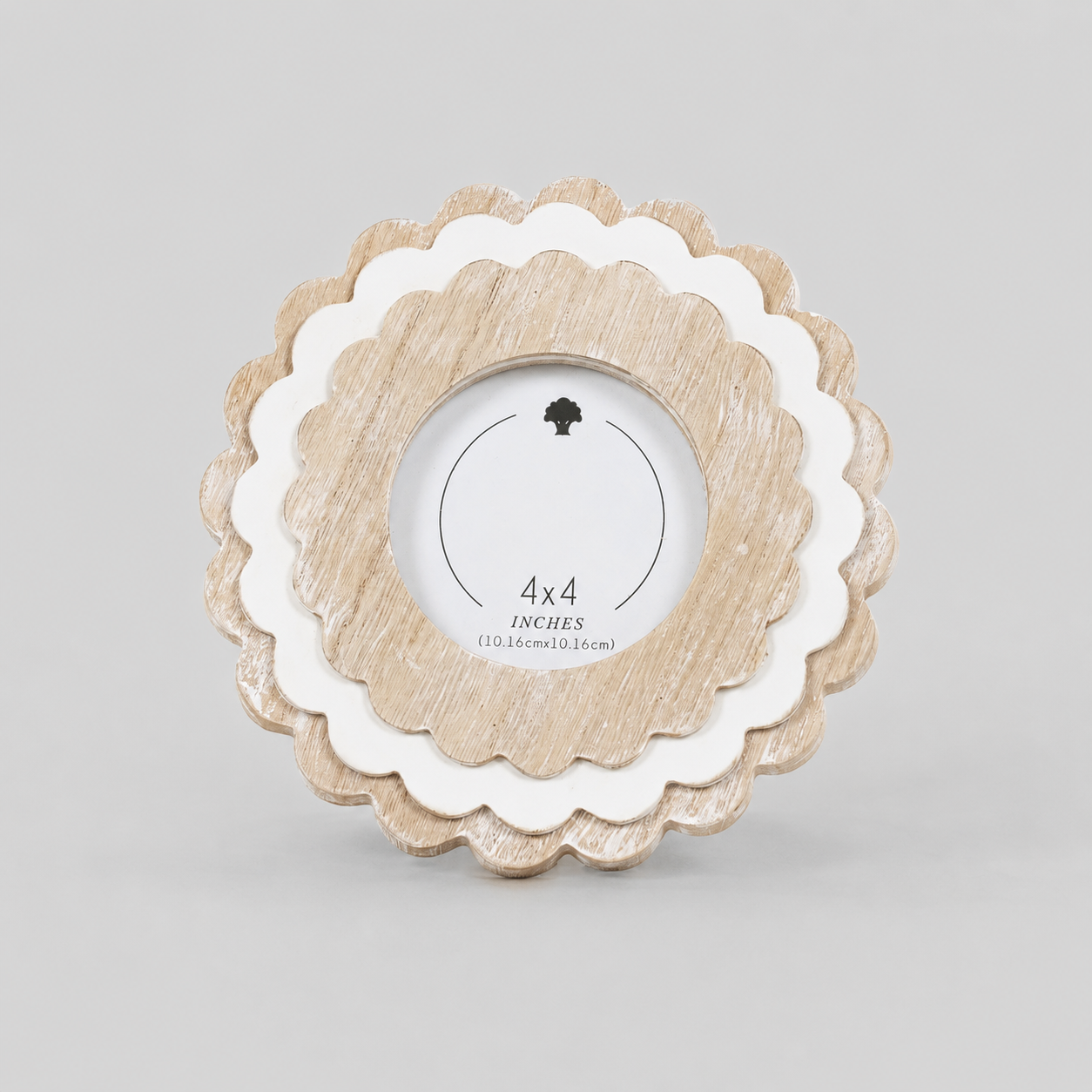 Natural and White round scalloped wood picture frame holding a 4x4 photo