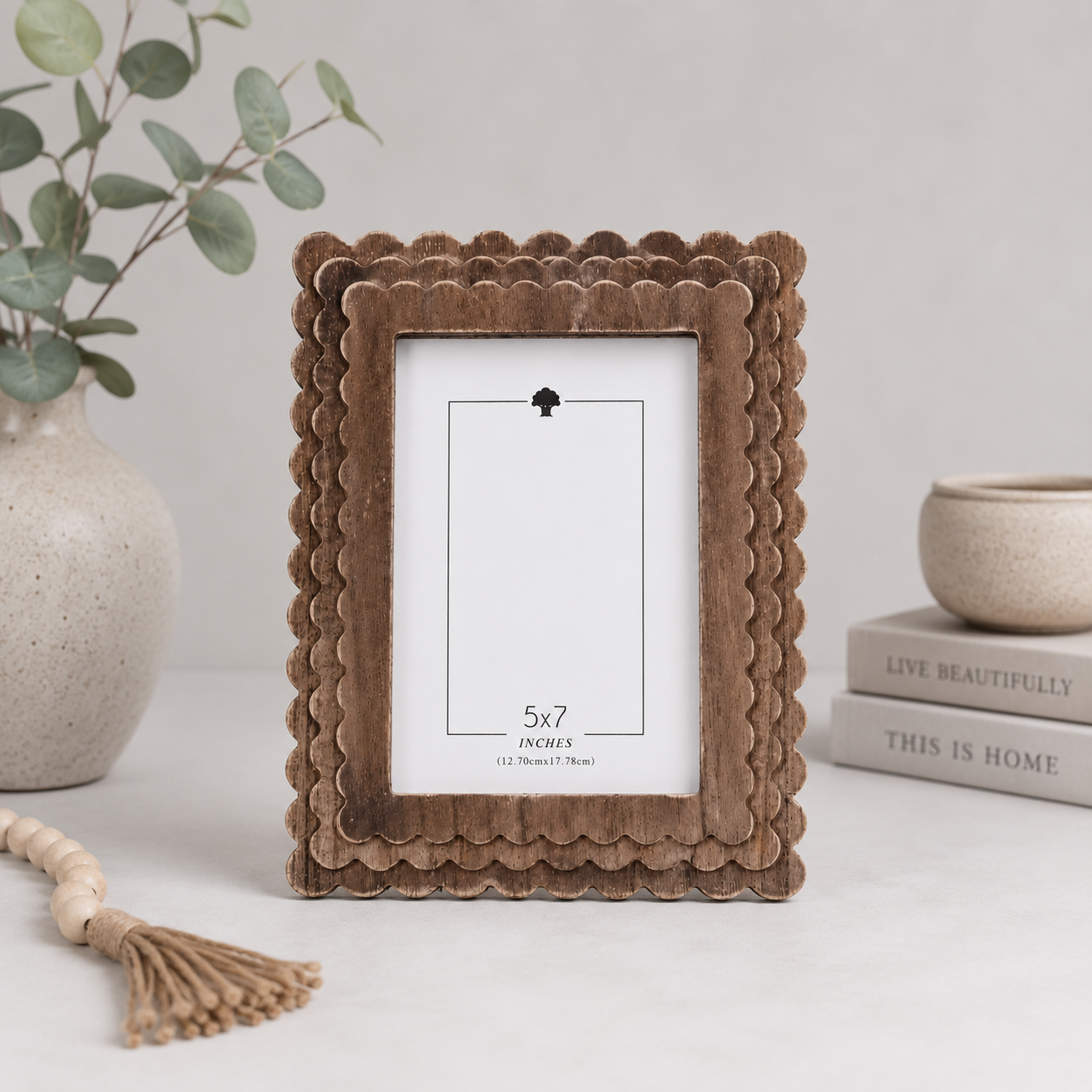 Espresso scalloped wood picture frame holding a 5x7 photo, side detail view