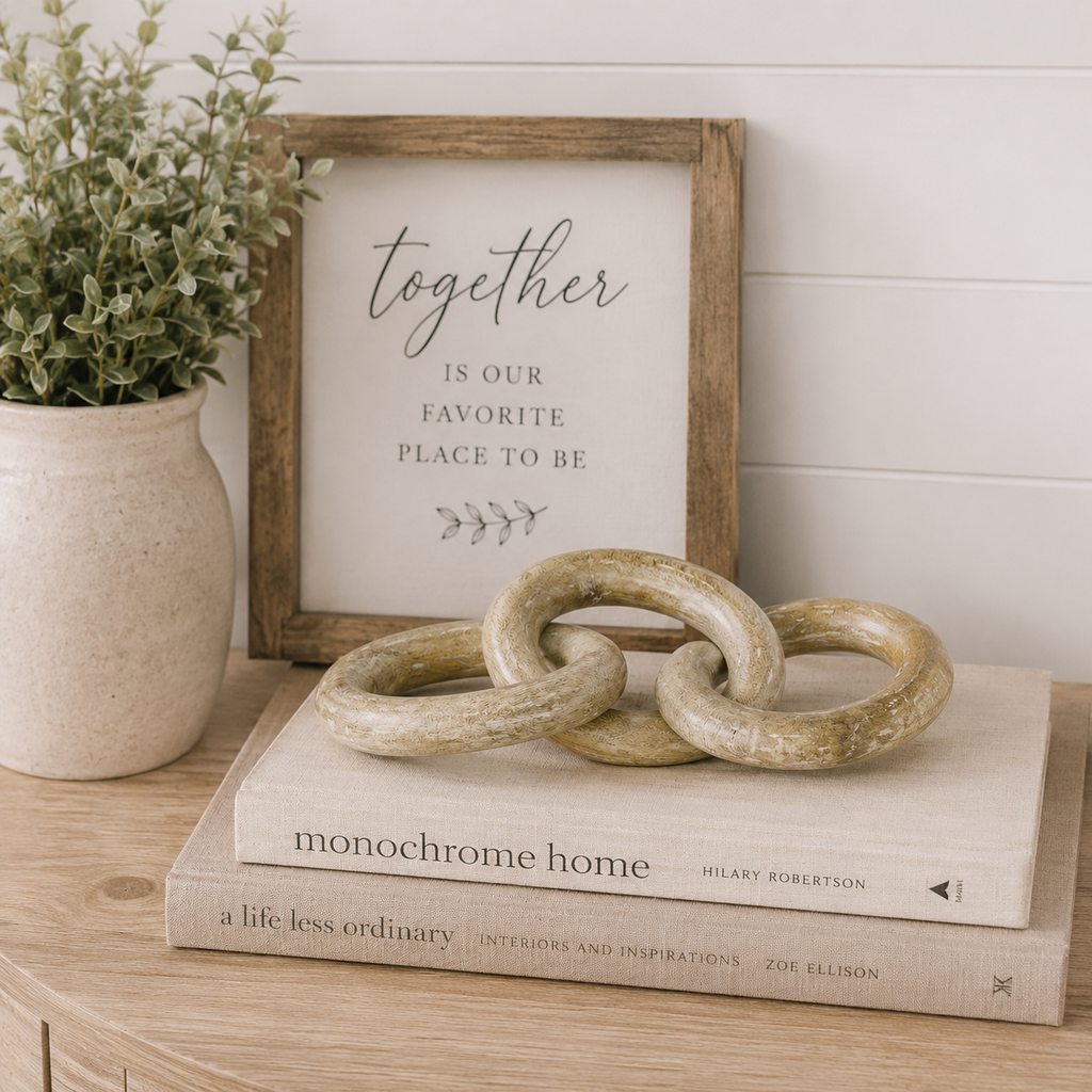 Natural mango wood decorative chain displayed as a tabletop styling accent.