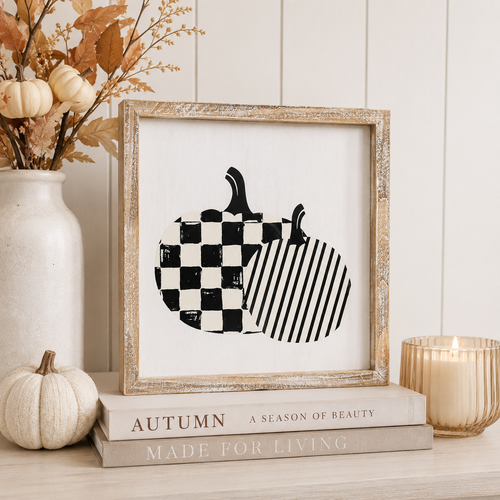 Reversible wood framed sign featuring pumpkin and pie styled on a shelf or console table.